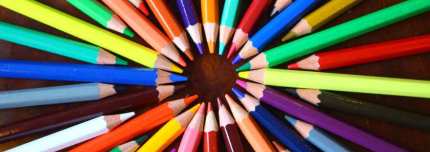 differently-coloured pencils with their points meeting to form a circle